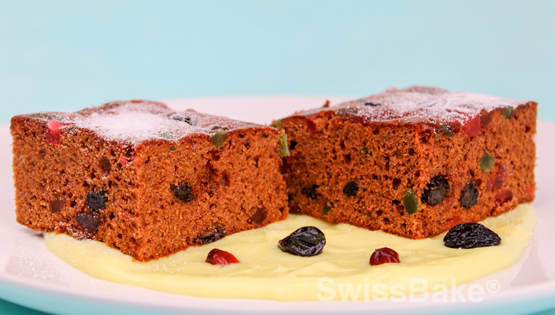 Deluxe Spiced Fruit Cake with Eggnog Sauce